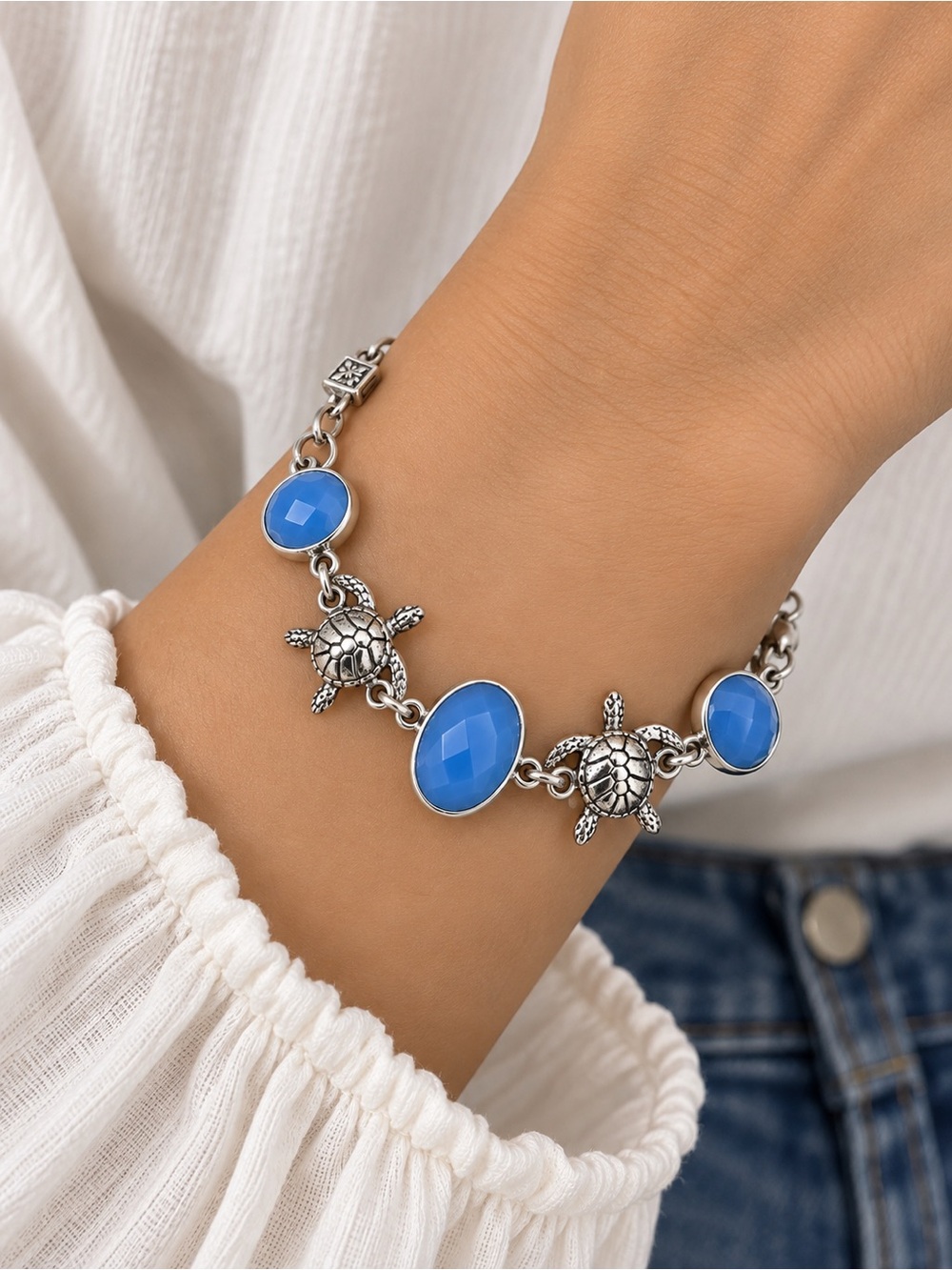 Sterling Silver Turtle Charm Bracelet with Blue Stones
